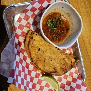 El Chilango Chido signature dishes Mole Poblano TacoCrispy TacoBreakfast Burrito
